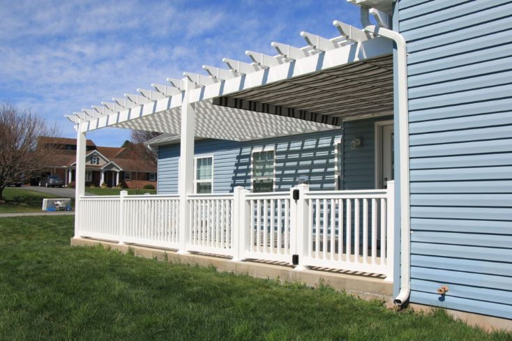 Wall attached pergola over patio