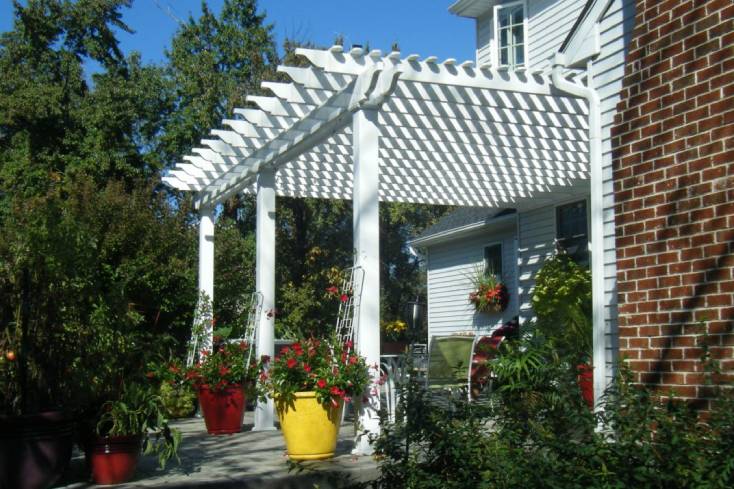 white pergola shapes tuscany attached model next to brick wall